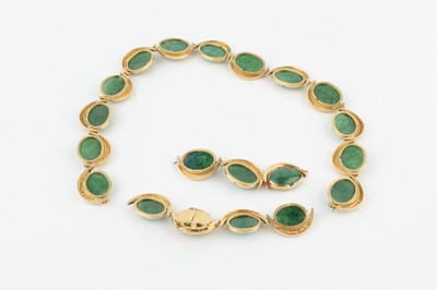 Lot 134 - An 18k gold, green stone and diamond necklace,...