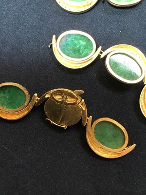 Lot 134 - An 18k gold, green stone and diamond necklace,...