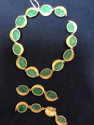 Lot 134 - An 18k gold, green stone and diamond necklace,...