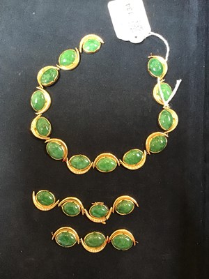 Lot 134 - An 18k gold, green stone and diamond necklace,...