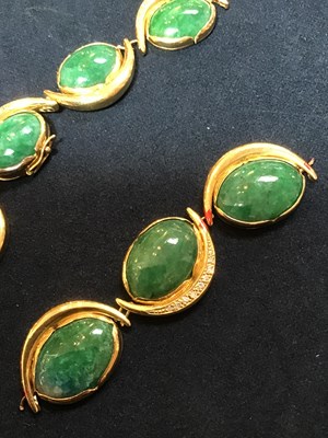 Lot 134 - An 18k gold, green stone and diamond necklace,...