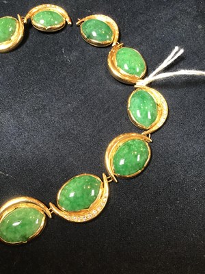 Lot 134 - An 18k gold, green stone and diamond necklace,...