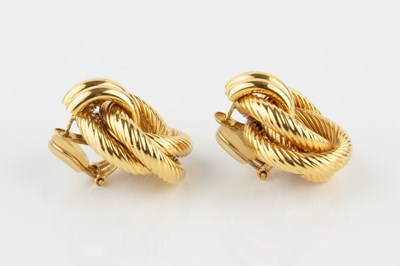 Lot A pair of 18k gold ear clips, of ropetwist...
