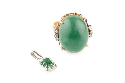 Lot 137 - A green stone and diamond dress ring, the oval...