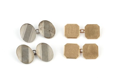 Lot 145 - A pair of 9ct gold cufflinks, of chamfered...