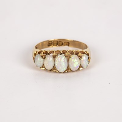 Lot 446 - 18ct gold ring set with five cabochon opals,...