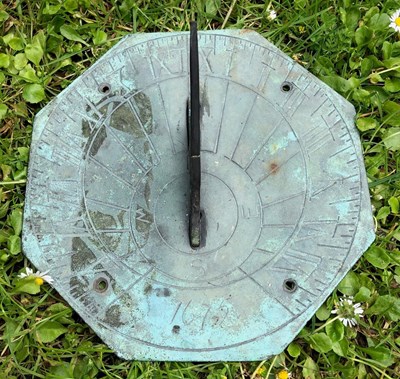 Lot 1380 - A bronze sundial plate