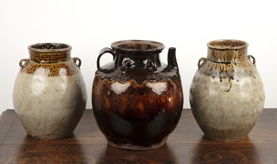 Lot 453 - Treacle glazed vase with a spout and five...