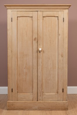 Lot 1023 - A pine two-door wardrobe