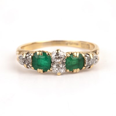 Lot 492 - 18ct gold emerald and diamond ring set with...