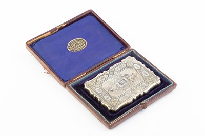 Lot 529 - A mid Victorian silver card case, of shaped...