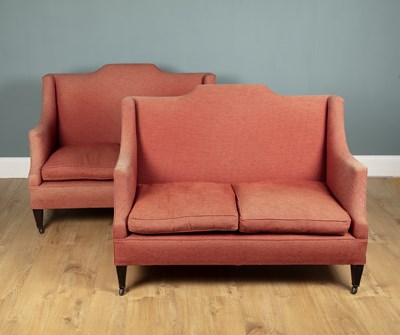 Lot 93 - A pair of pink upholstered two-seater sofas