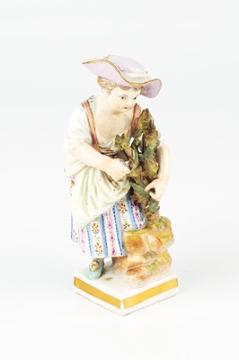 Lot 366 - A 19th century Meissen small figure of a girl,...