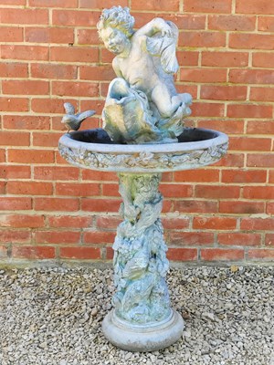 Lot 1381 - A cast composite birdbath