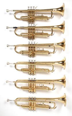 Lot 140 - A 'Sonata' brass trumpet; and five further...