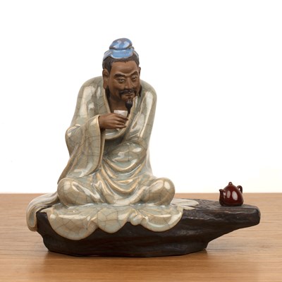 Lot 469 - Shiwan glazed model of the tea master Chinese,...