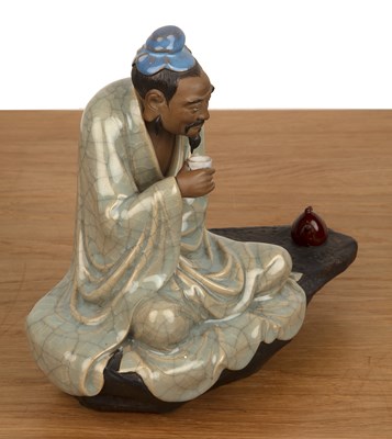 Lot 469 - Shiwan glazed model of the tea master Chinese,...