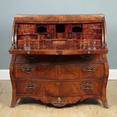 Lot 163 - A 19th century French mahogany bombe roll-top bureau