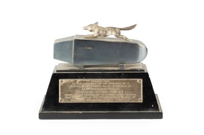 Lot 250 - A silver presentation model of a running fox,...