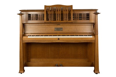 Lot 122 - A C. Bechstein upright oak piano, in Arts and...