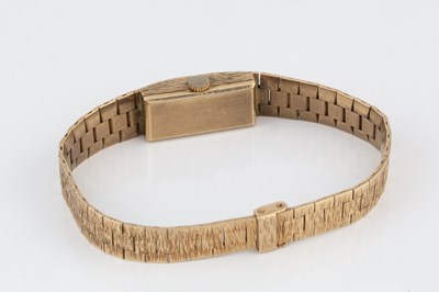 Lot 340 - A lady's 9ct gold bracelet watch by...
