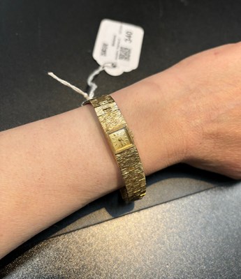 Lot 340 - A lady's 9ct gold bracelet watch by...