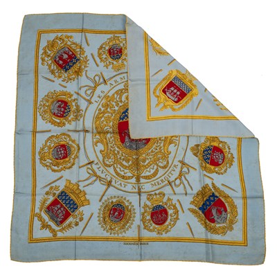 Lot 584 - A ‘Les Armes de Paris’ silk scarf by Hermès,...