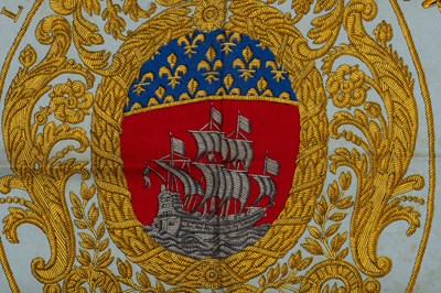 Lot 584 - A ‘Les Armes de Paris’ silk scarf by Hermès,...