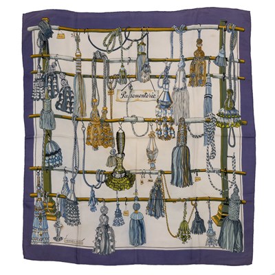 Lot 572 - A ‘Passementerie’ silk scarf by Hermès,...