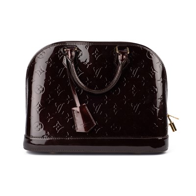 Lot 507 - A Louis Vuitton ‘Alma PM’ in patent leather...