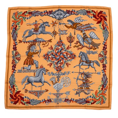 Lot 579 - A ‘Les Girouettes’ silk scarf by Hermès,...