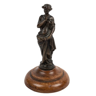 Lot 674 - A small antique bronze sculpture of a girl in classical dress