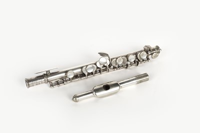 Lot 107 - A white metal piccolo, 'Migmal', inscribed G.R....