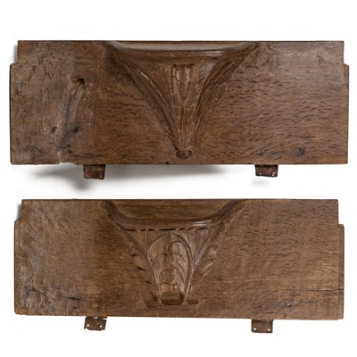 Lot 478 - A near pair of 15th century carved oak misericord