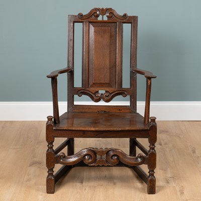 Lot 328 - An early 18th century oak panelled-back Shropshire chair