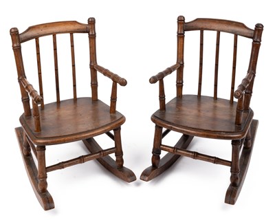 Lot 121 - A pair of Regency style miniature turned wood rocking chairs