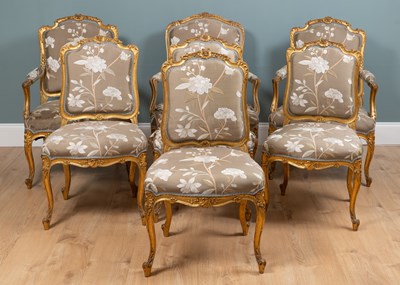 Lot 223 - A set of six Louis XVI style giltwood chairs together with a further open armchair