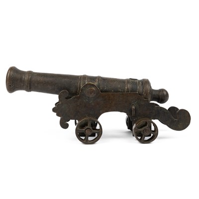 Lot 481 - A small bronze model of a cannon