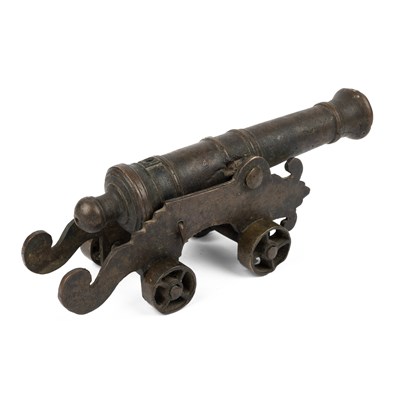 Lot 481 - A small bronze model of a cannon