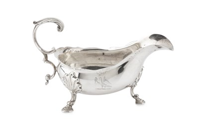 Lot A George II silver sauce boat, with shaped...