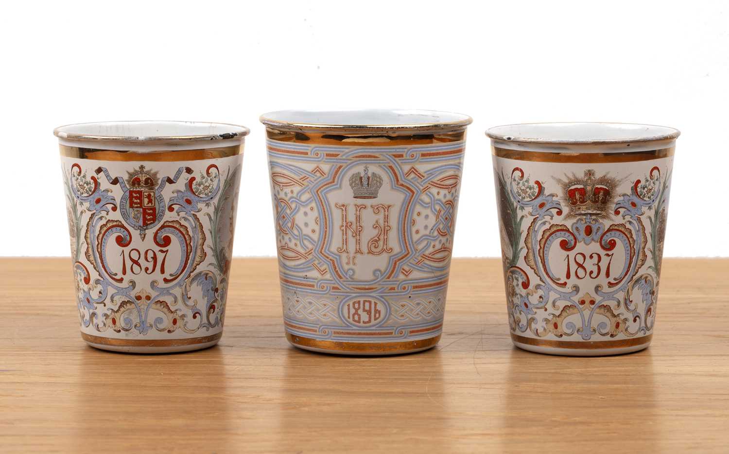 Lot 294 - Three enamel beakers comprising a Russian...