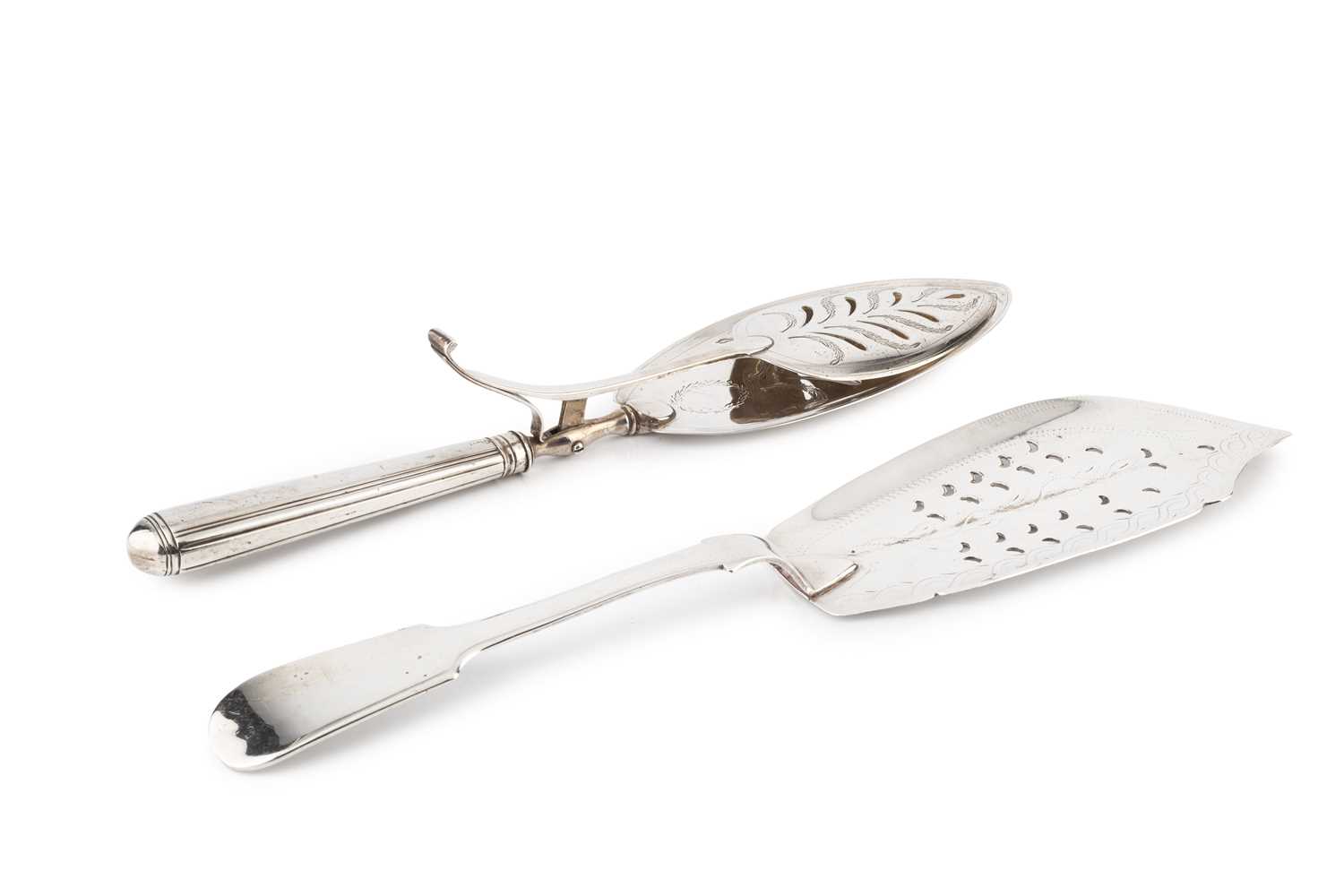 Lot 696 - A George III silver fish slice, the oval...