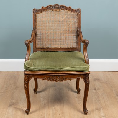 Lot 482 - An antique French open armchair