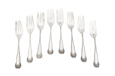 Lot 698 - A set of eight American silver cake forks,...