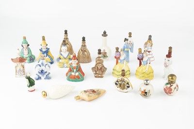 Lot 349 - A collection of porcelain figural scent...