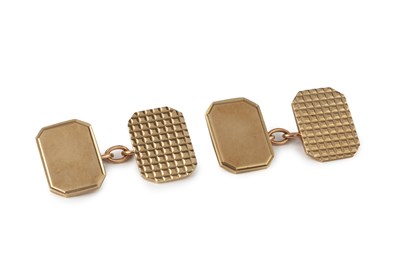 Lot 129 - A pair of 9ct gold cufflinks, with chequered...