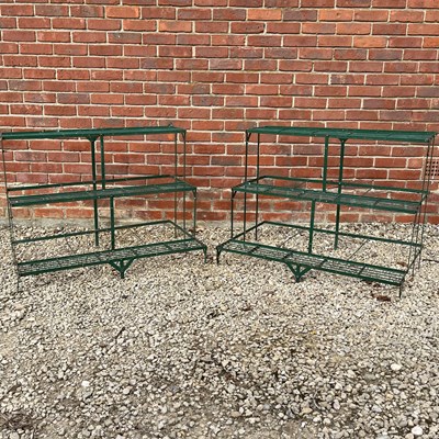 Lot 1475 - A pair of three-tier conservatory plant stands