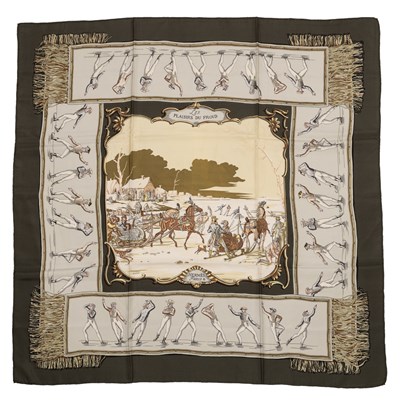 Lot 588 - A ‘Les Plaisirs du Froid’ silk scarf by Hermès,...