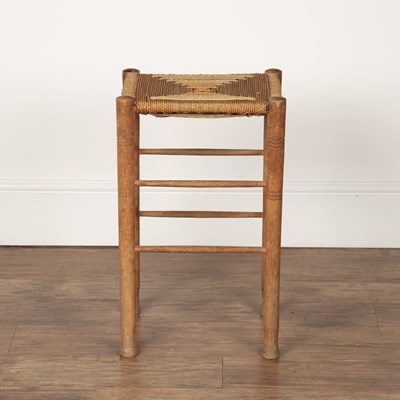 Lot 28 - Cotswold School two stools with raffia strung...
