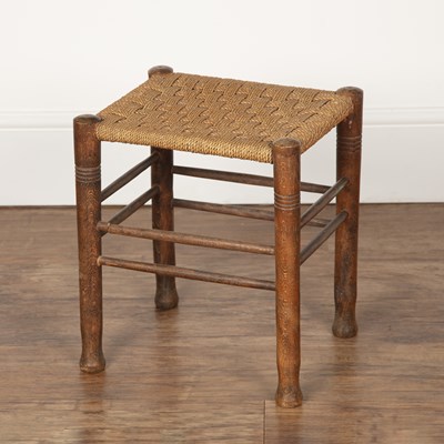 Lot 28 - Cotswold School two stools with raffia strung...